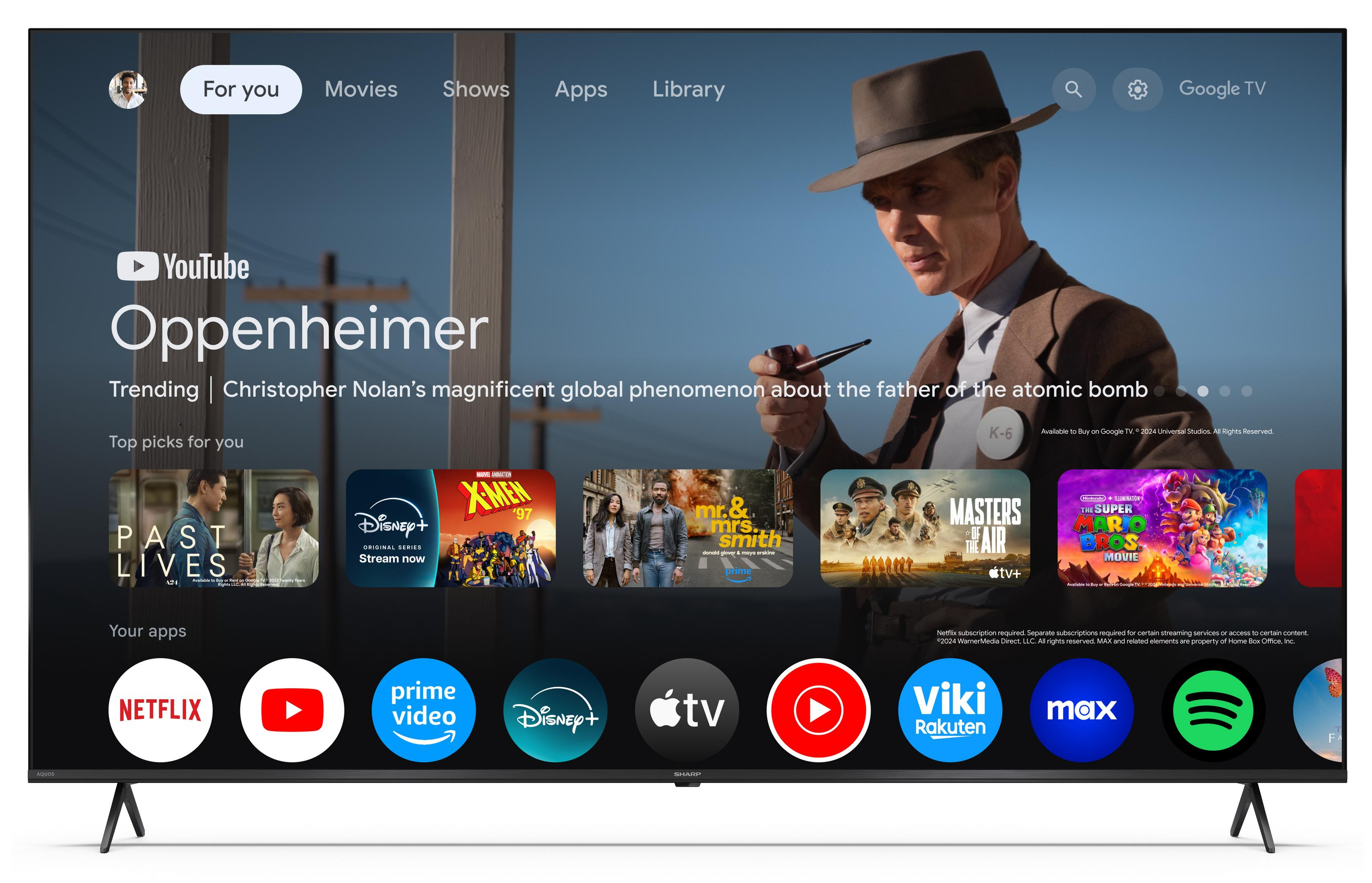 L'interface Google TV affiche Oppenheimer, des affiches de films et des icônes d'applications.