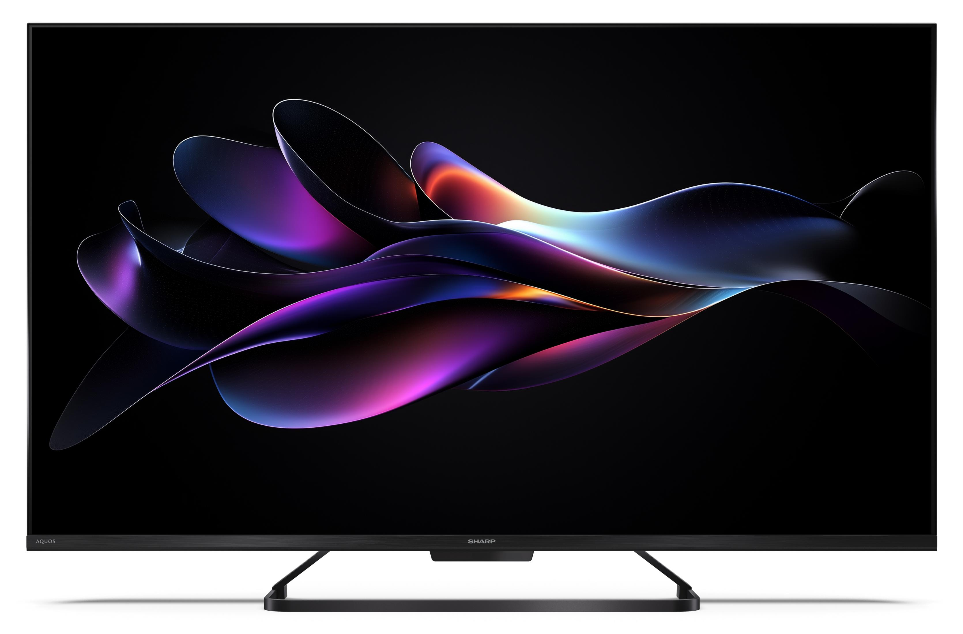 TV moderna con grafica astratta e colorata su sfondo nero.