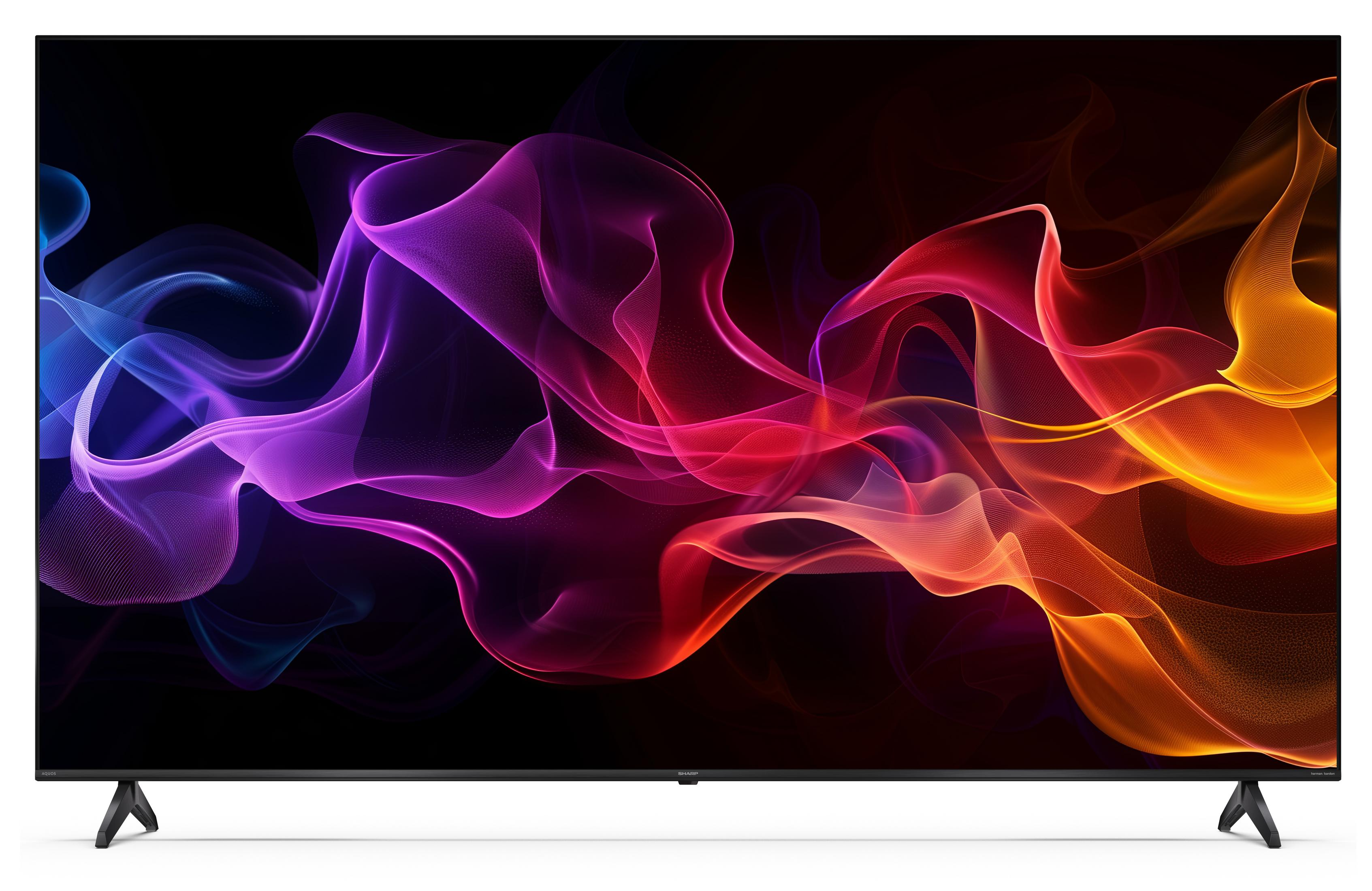 Une télévision moderne affichant un motif dynamique et fumé dans des tons violets, roses et oranges.