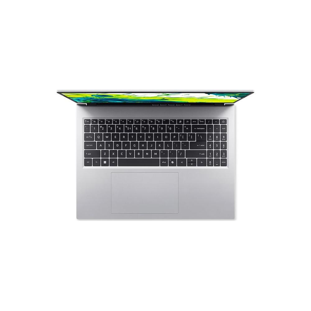 Un laptop argento con lo schermo aperto, che mostra uno sfondo colorato. Vista dall'alto.