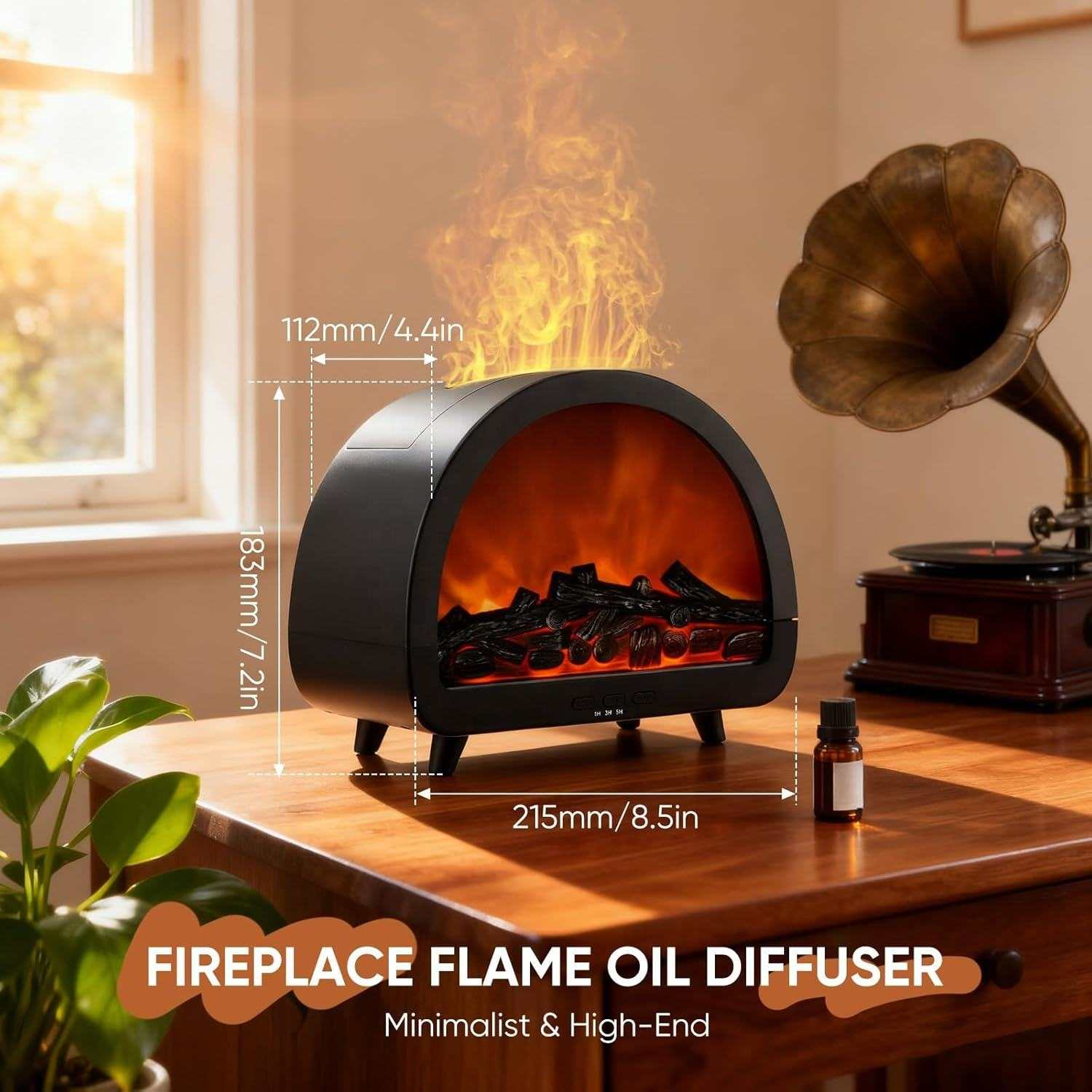 Ein schwarzer Flammen-Öldiffusor mit Maßen, ein Grammophon und eine Pflanze auf einem Holztisch.