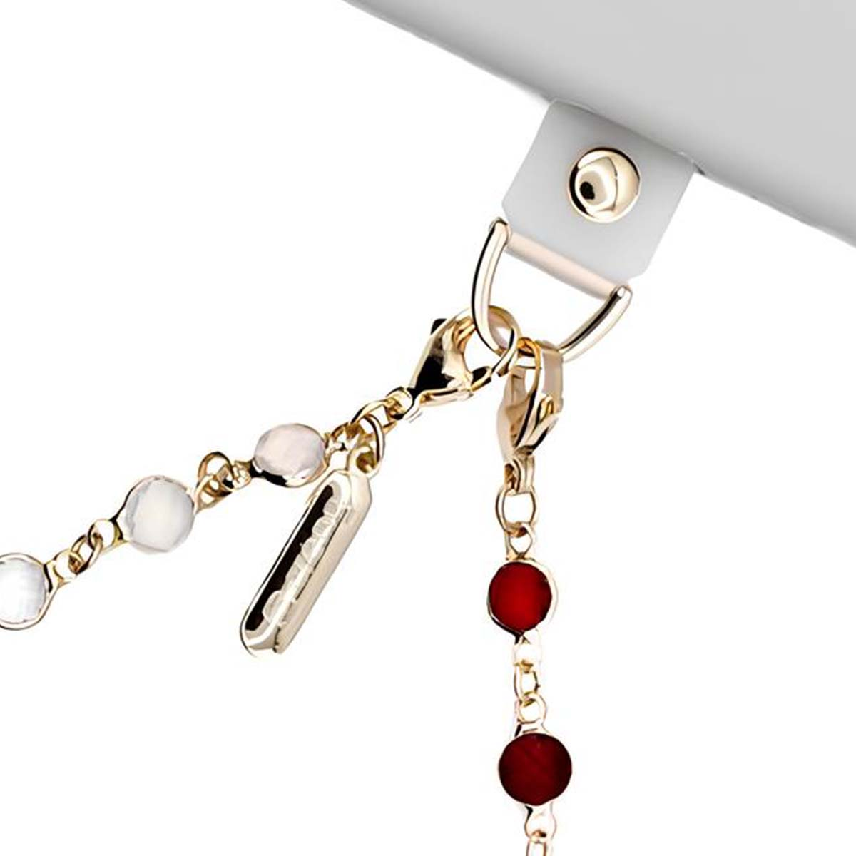 Goldene Kette mit weißen und roten Perlen, an einem weißen Band befestigt.