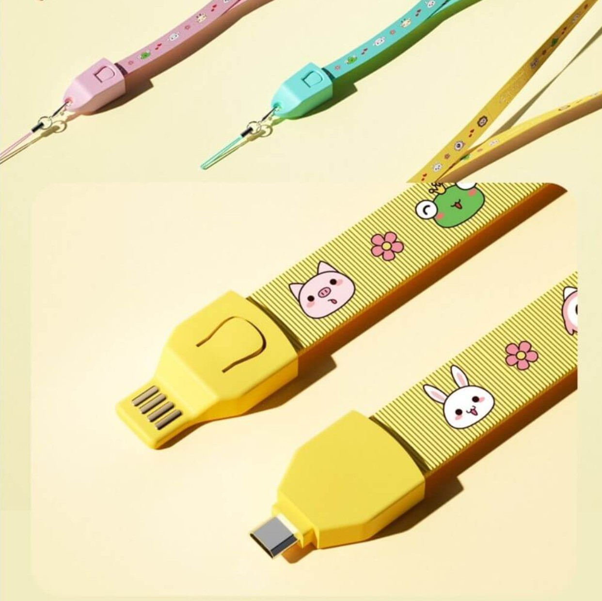 Drei bunte Lanyards mit niedlichen Tiermotiven und USB-Anschlüssen.