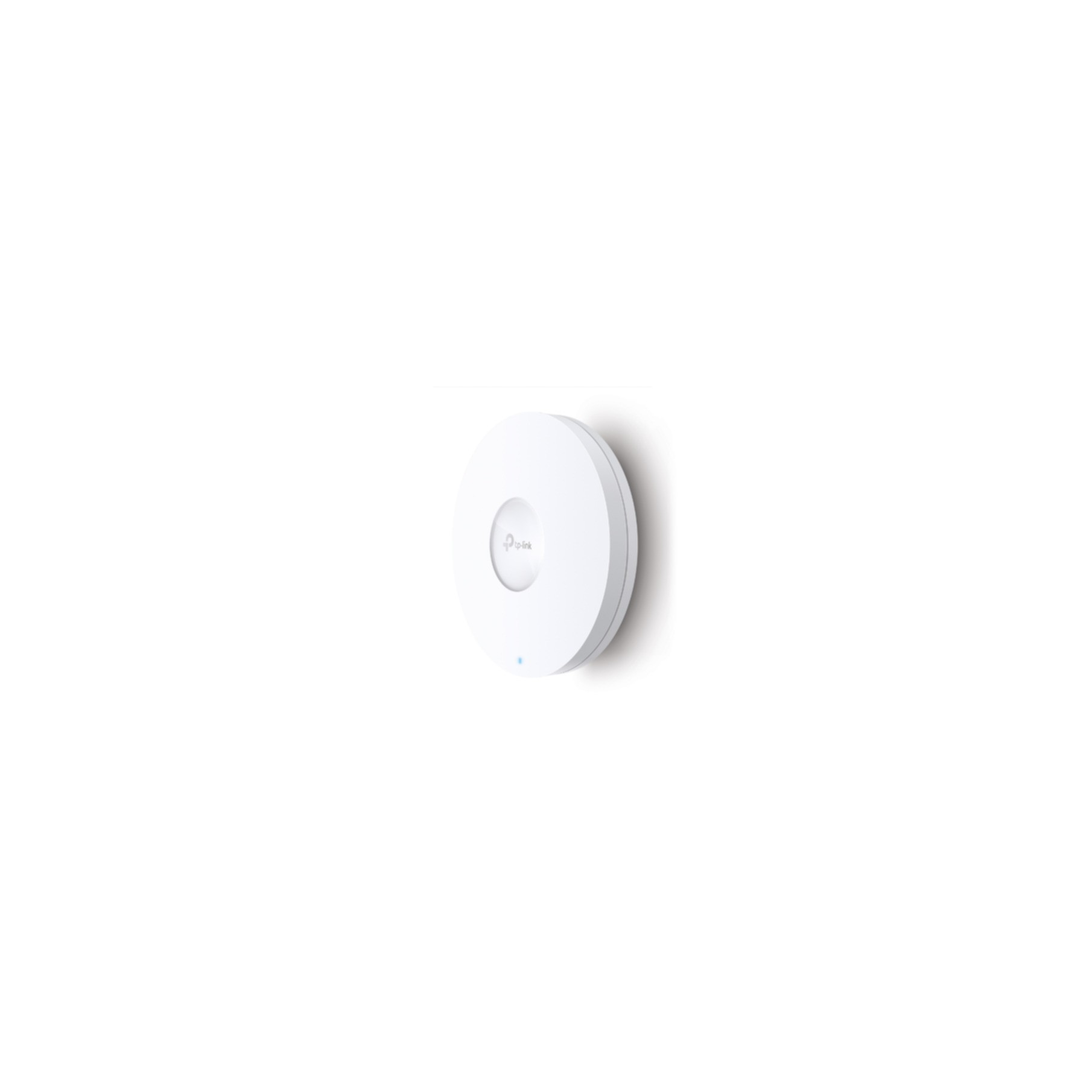 A white circular TP-Link access point is mounted on a wall.