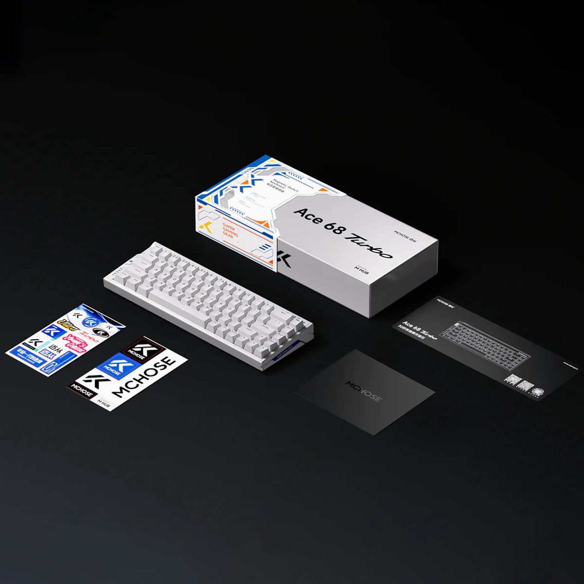 A white keyboard with packaging, stickers, and instructions on a black background.