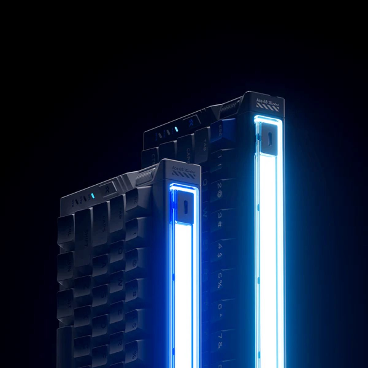 Two dark keyboards with blue lights, one in front, one behind.