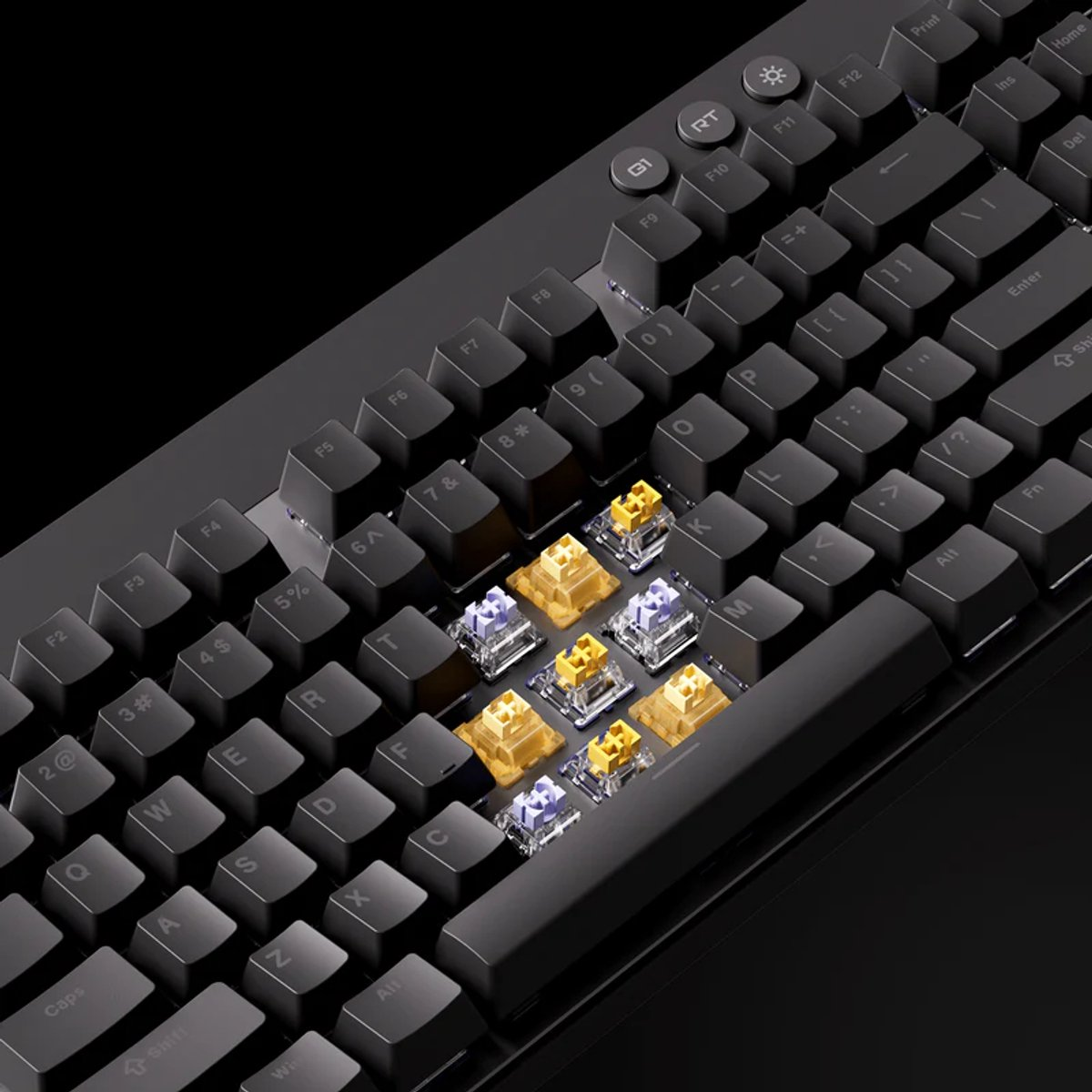 Black keyboard with yellow and blue switches. Close-up.