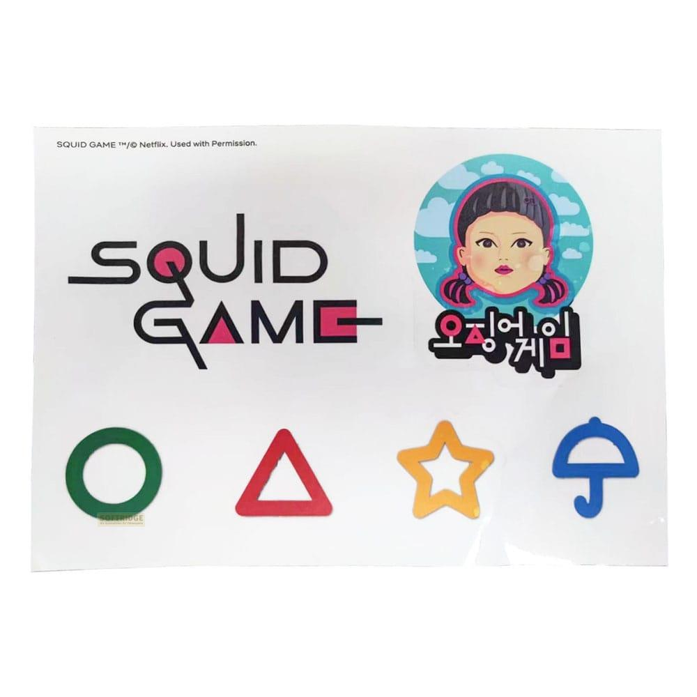 Logo de Squid Game con símbolos: círculo, triángulo, estrella, paraguas y cara de muñeca.