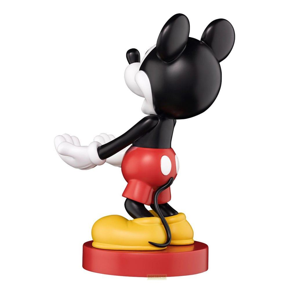 Statua di Topolino con pantaloncini rossi, guanti bianchi e scarpe gialle su base rossa.