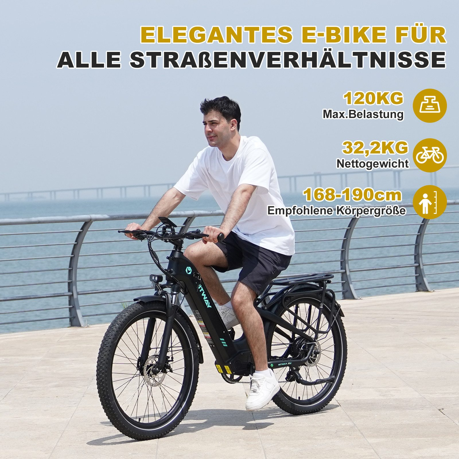 Ein Mann fährt ein schwarzes E-Bike am Wasser. Max. Belastung 120kg.