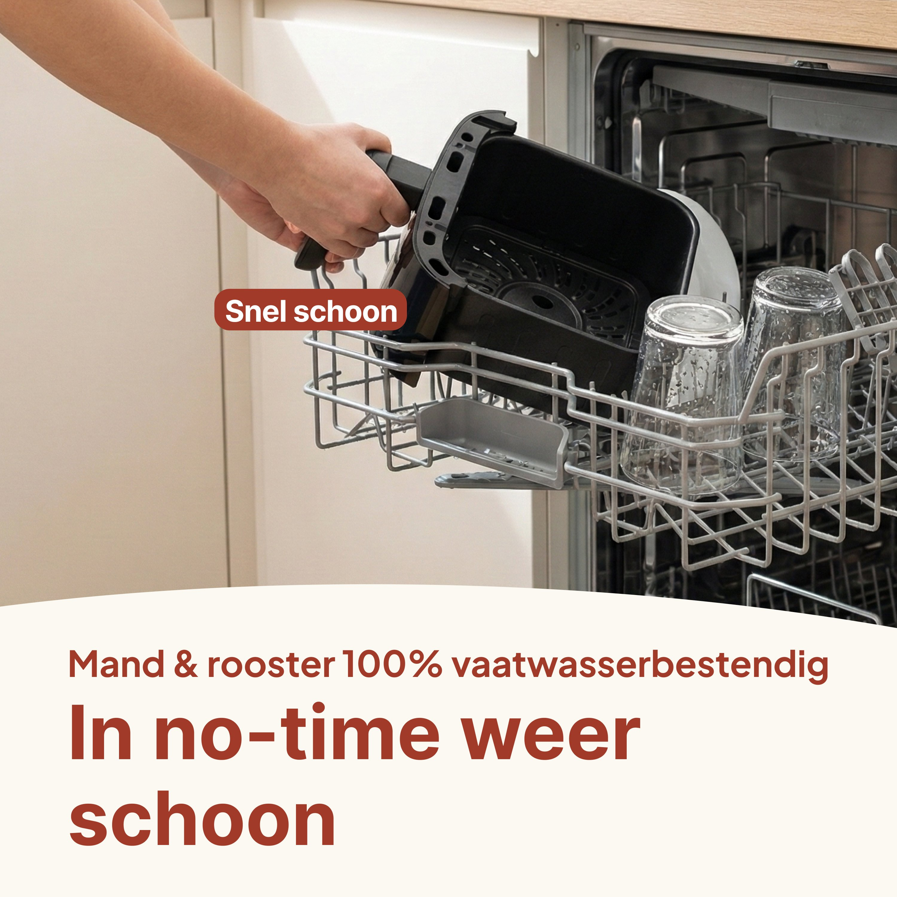 A hand places a black air fryer basket into a dishwasher with glasses.