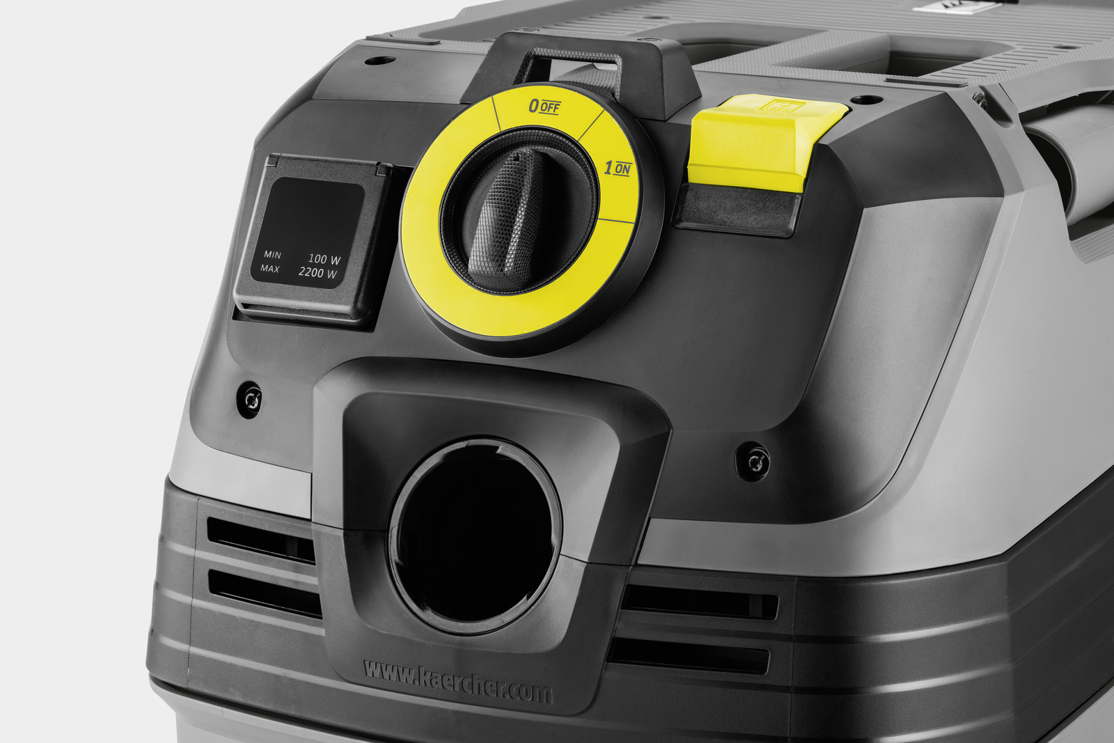 A Karcher vacuum cleaner with a yellow dial and yellow button. Details are visible.