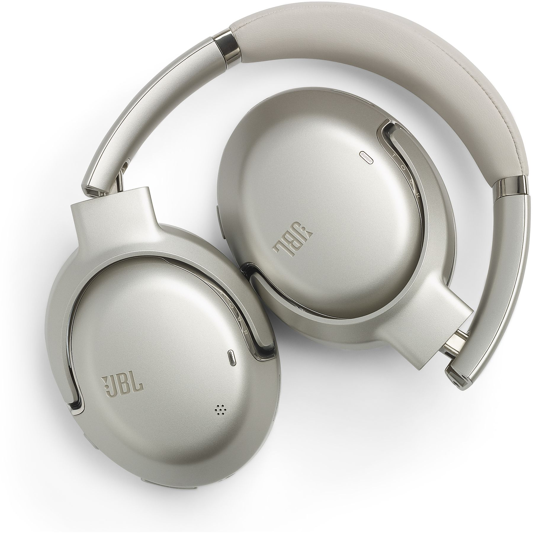 Srebrne słuchawki JBL z wyściełanym pałąkiem na białym tle.