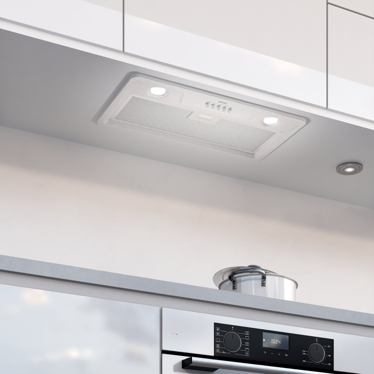 Een witte afzuigkap met lampen boven een oven.