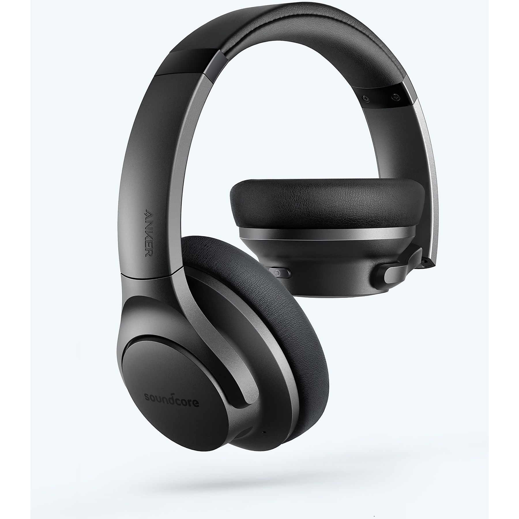 Czarne słuchawki nauszne z wyściełanym pałąkiem i nausznikami.