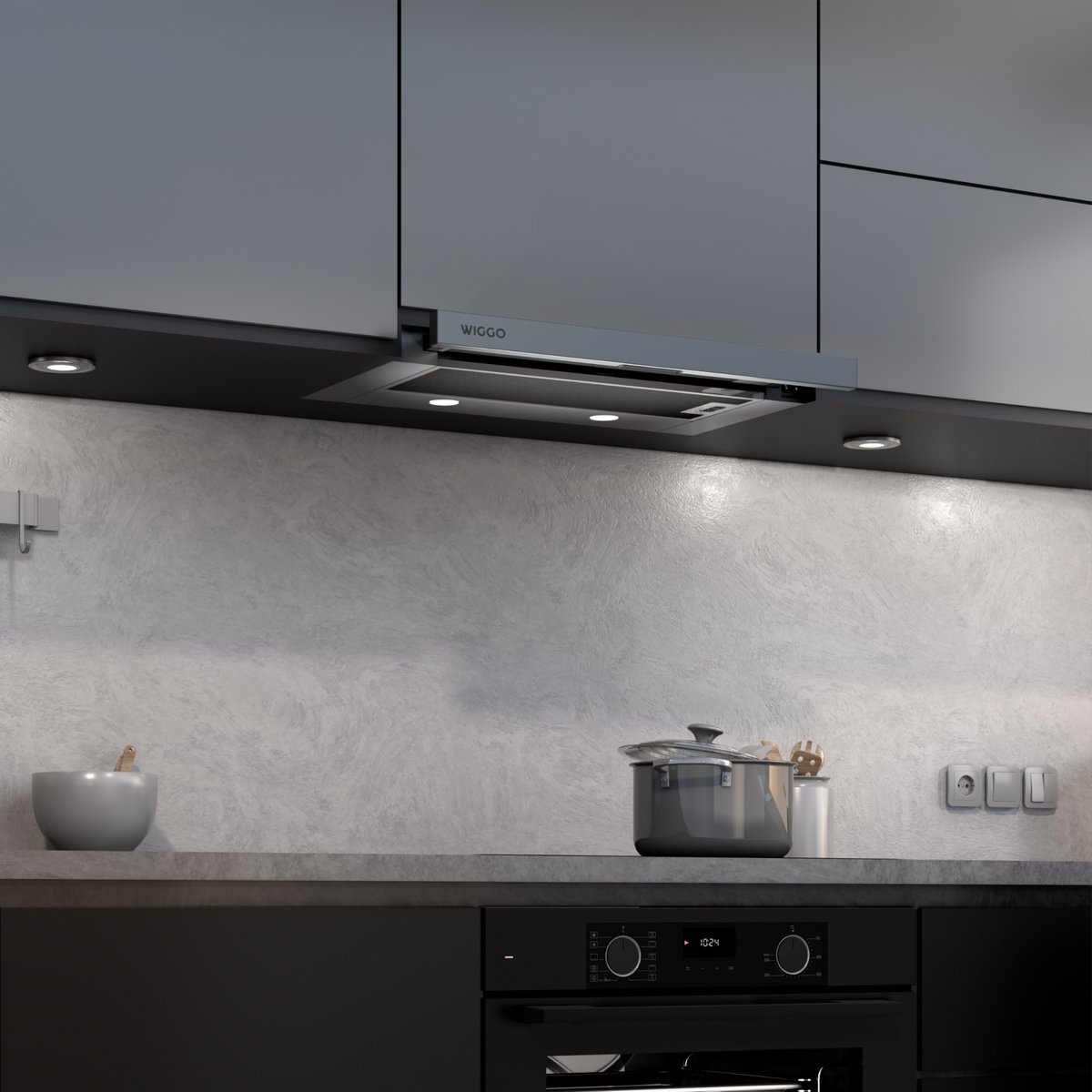 Moderne Küche mit Dunstabzugshaube, Topf, Schüssel und Backofen.