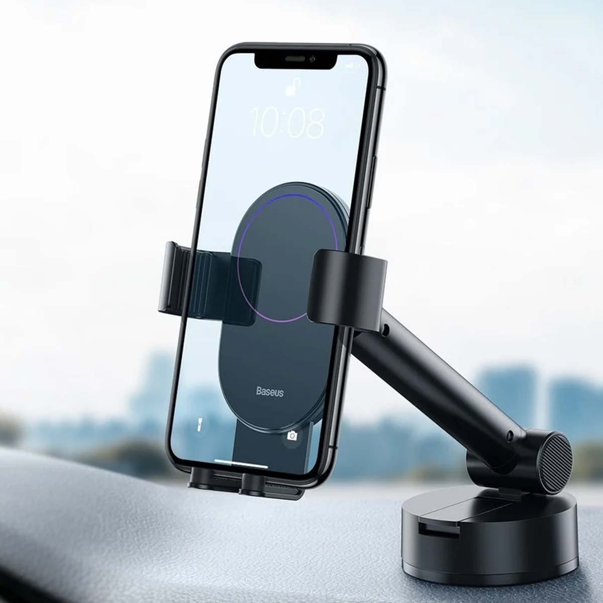 Czarny uchwyt na telefon ze smartfonem na ramieniu, zamontowany na powierzchni.