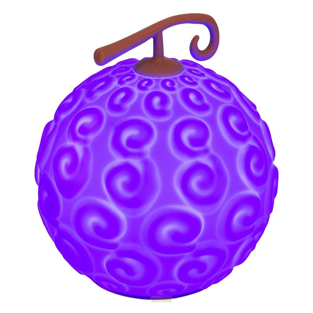 Un fruit du démon violet avec une tige brune et des motifs en spirale.