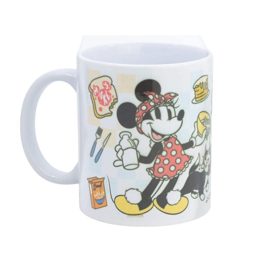 Minnie Mouse en una taza con motivos de desayuno y cubiertos.