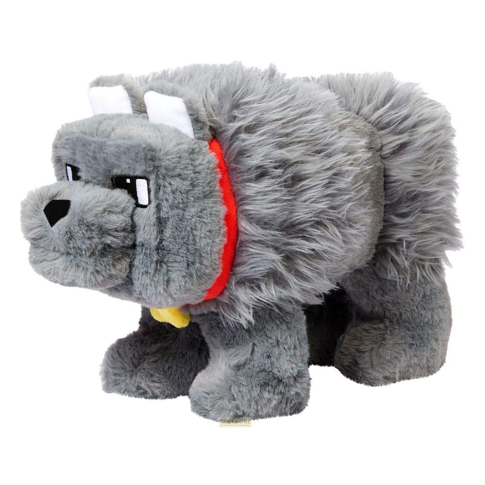 Un lupo di peluche grigio con orecchie bianche, collare rosso e etichetta gialla.
