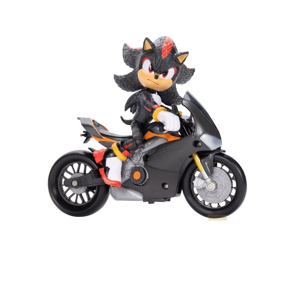 Un juguete de Shadow the Hedgehog montando una motocicleta sobre fondo blanco.