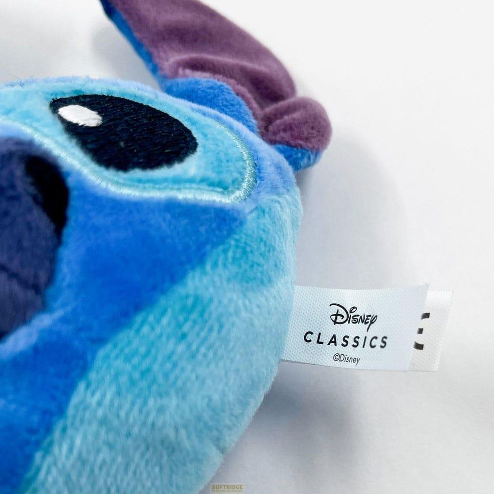 Ein blauer Stitch-Plüsch mit einem Disney Classics-Etikett.