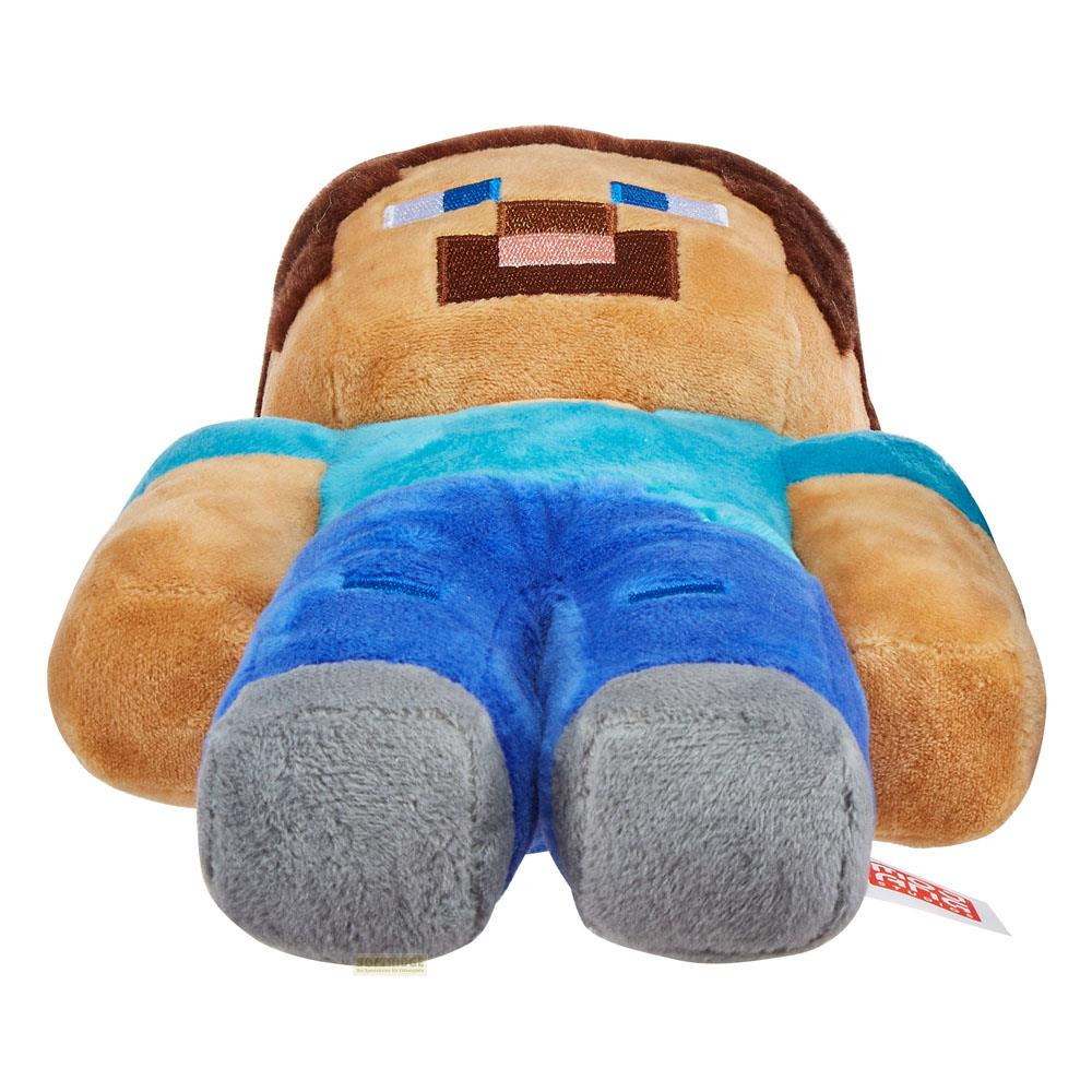 Ein Minecraft Steve Plüschtier mit braunem Haar, blauem Hemd und blauer Hose.