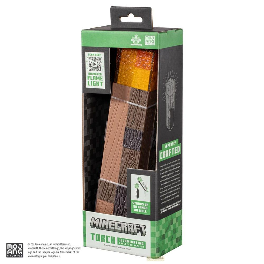 Embalaje de antorcha de Minecraft con luz de llama animada y mango de madera.