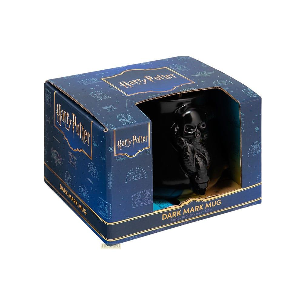 Una taza negra Marca Tenebrosa de Harry Potter se muestra en su empaque azul oscuro.