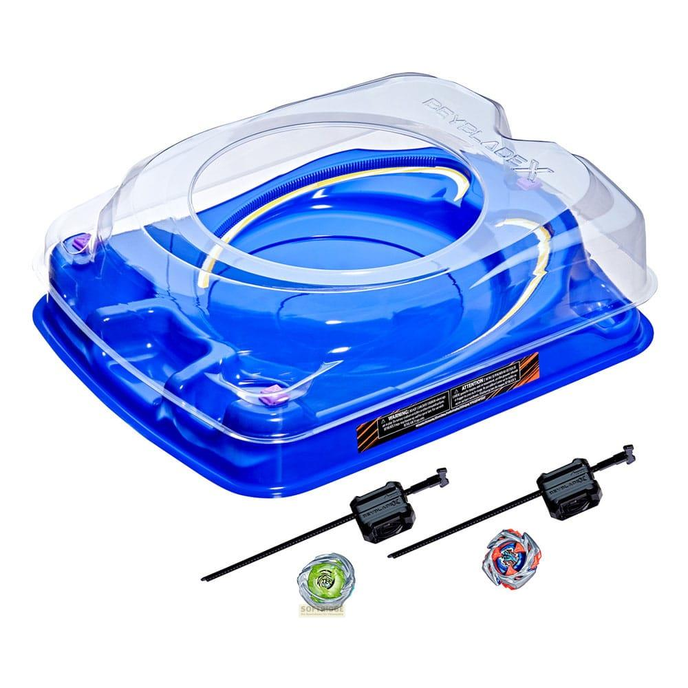 Un estadio azul de Beyblade con dos peonzas y lanzadores.