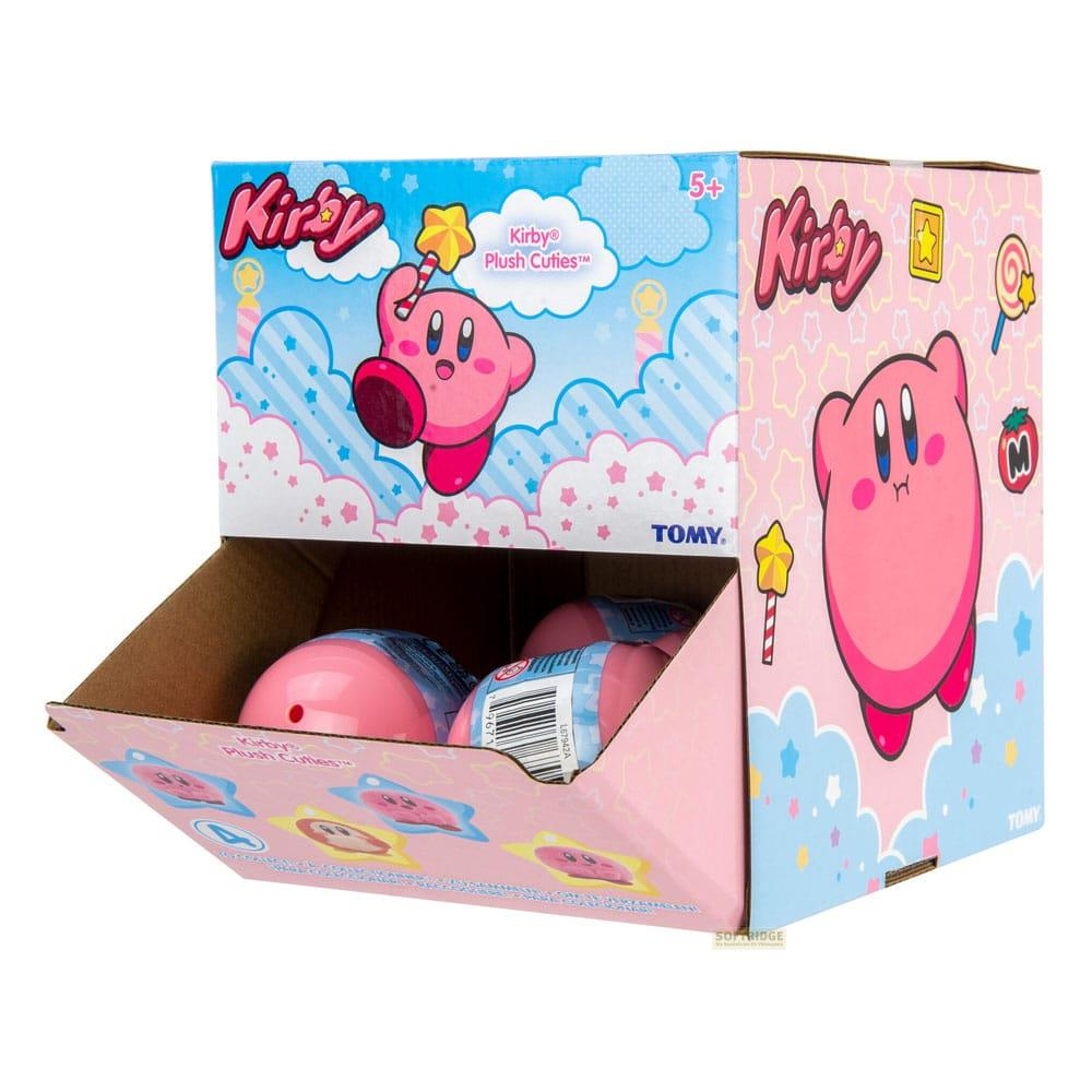 Emballage de peluches Kirby, avec plusieurs boules roses visibles devant.