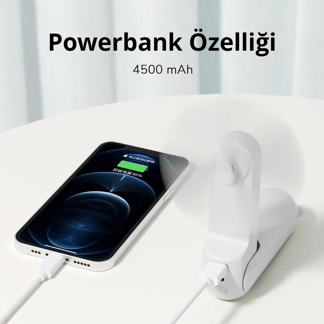 Pil seviyesi %92 olan bir akıllı telefon, beyaz bir powerbank'tan şarj oluyor.