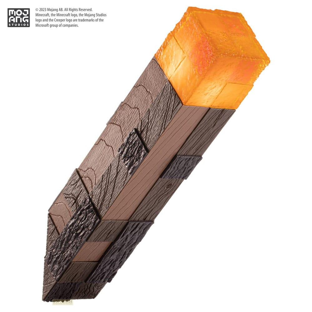 Antorcha de Minecraft con mango de madera y cabeza en llamas.