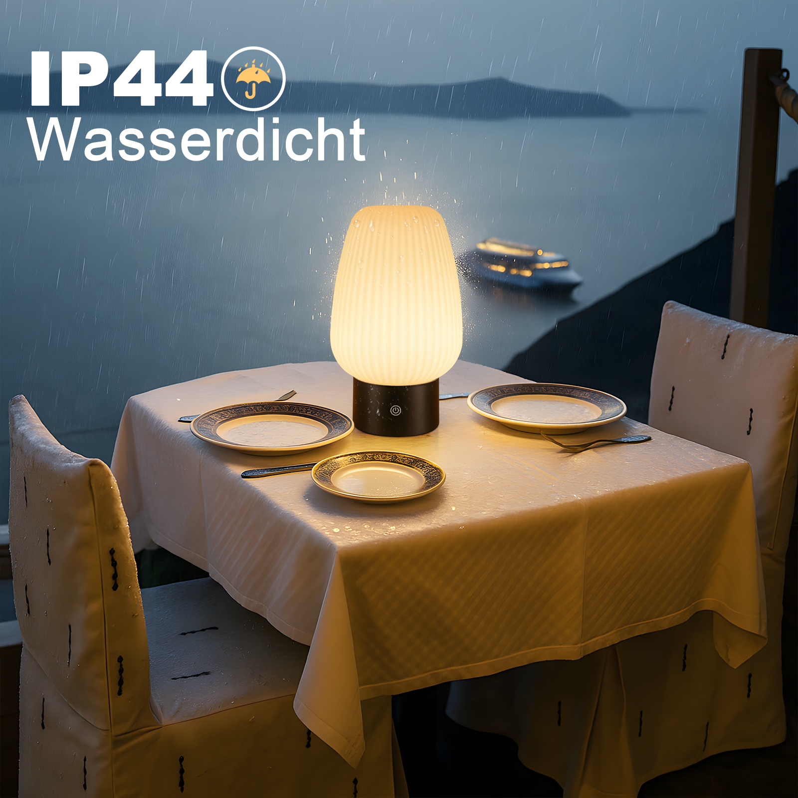 Oświetlony stół w deszczu z widokiem na morze i łódź. IP44.