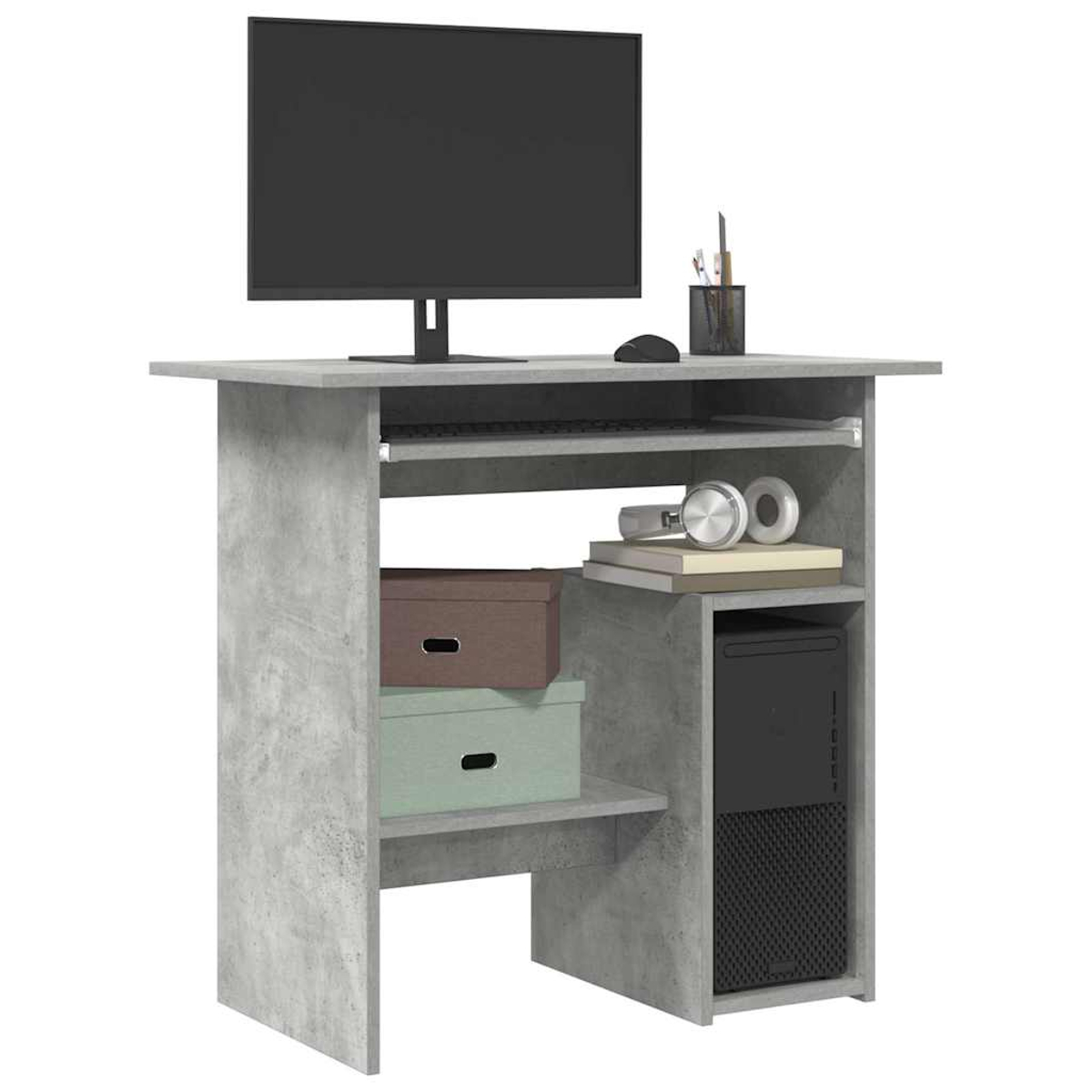 Ein grauer Schreibtisch mit einem Monitor, Tastatur, Maus, Kopfhörern, PC und Boxen.