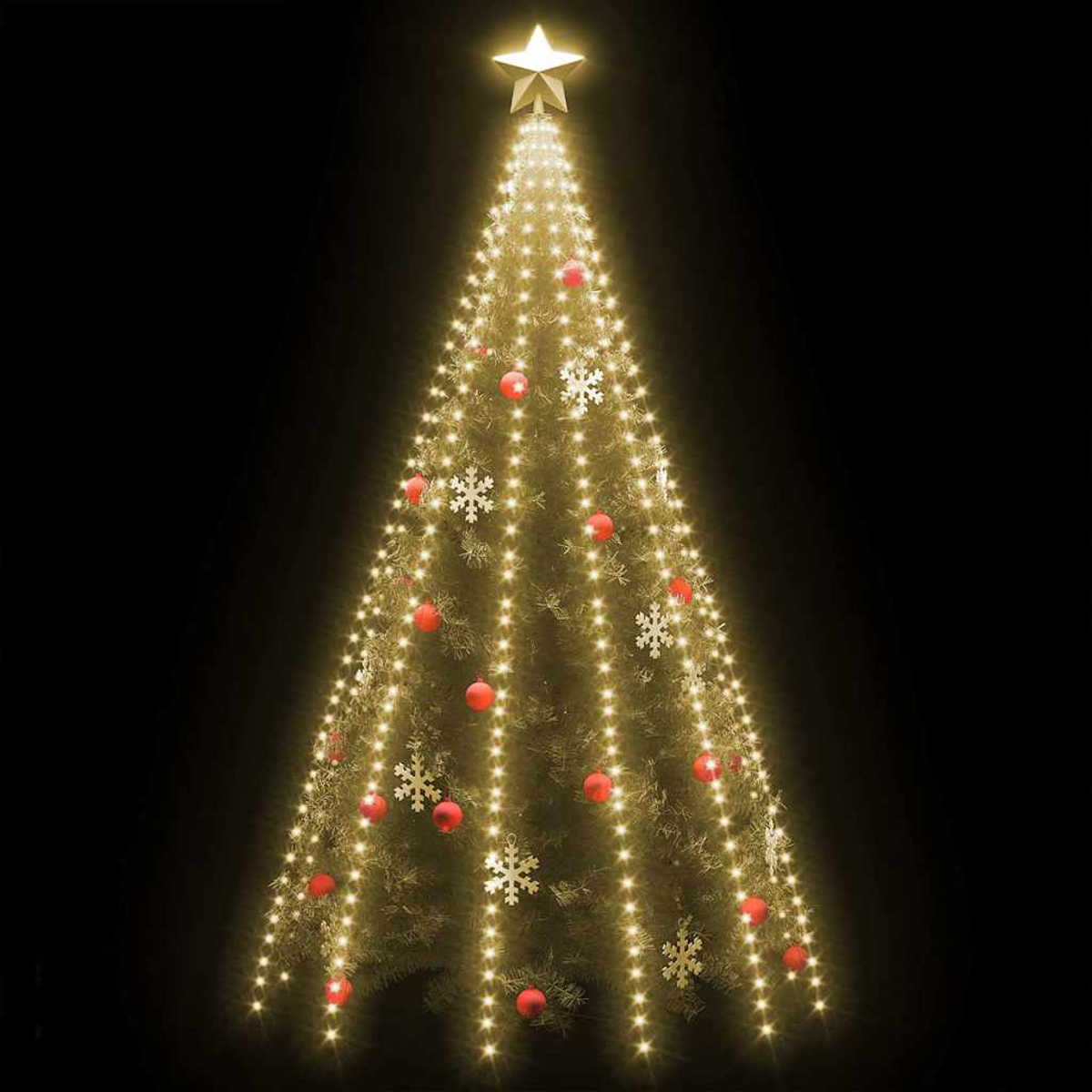 Ein beleuchteter Weihnachtsbaum mit Stern, Kugeln und Schneeflocken auf schwarzem Hintergrund.