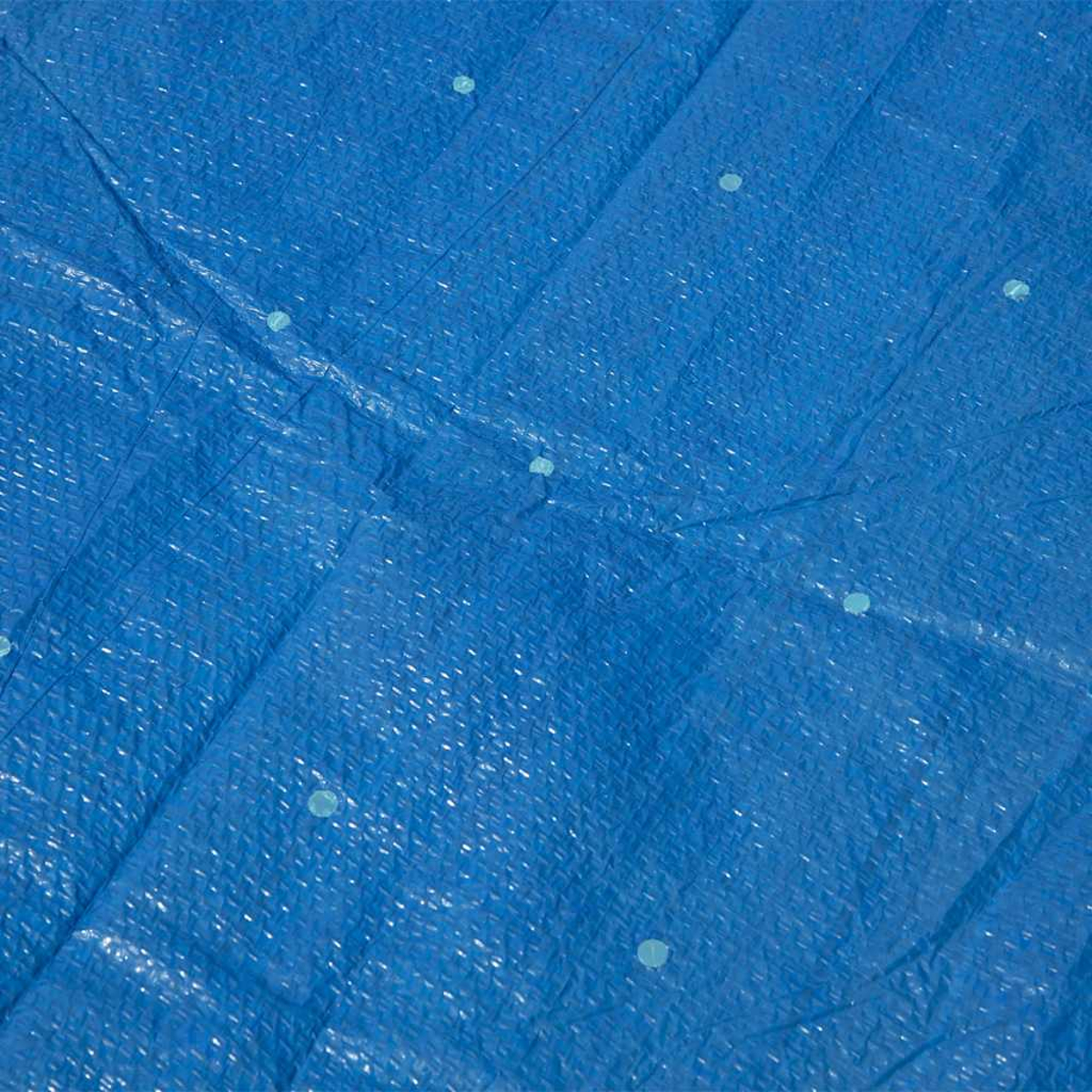 Eine blaue Plane mit einem rautenförmigen Muster und hellblauen Punkten.