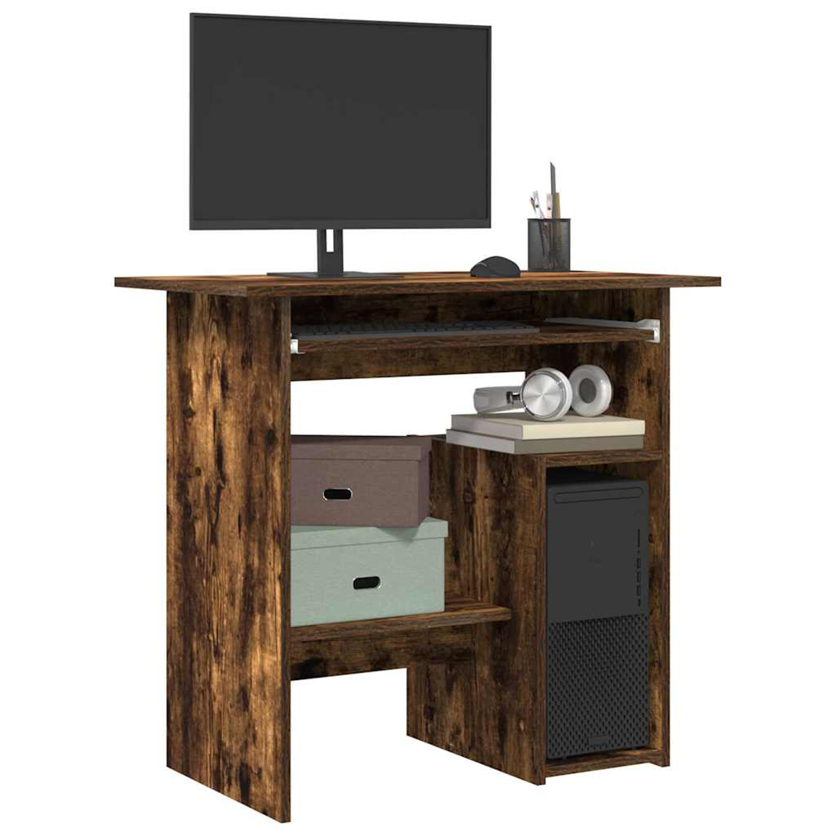 Ein Holztisch mit einem Monitor, Tastatur, Computer, Boxen und Kopfhörern.