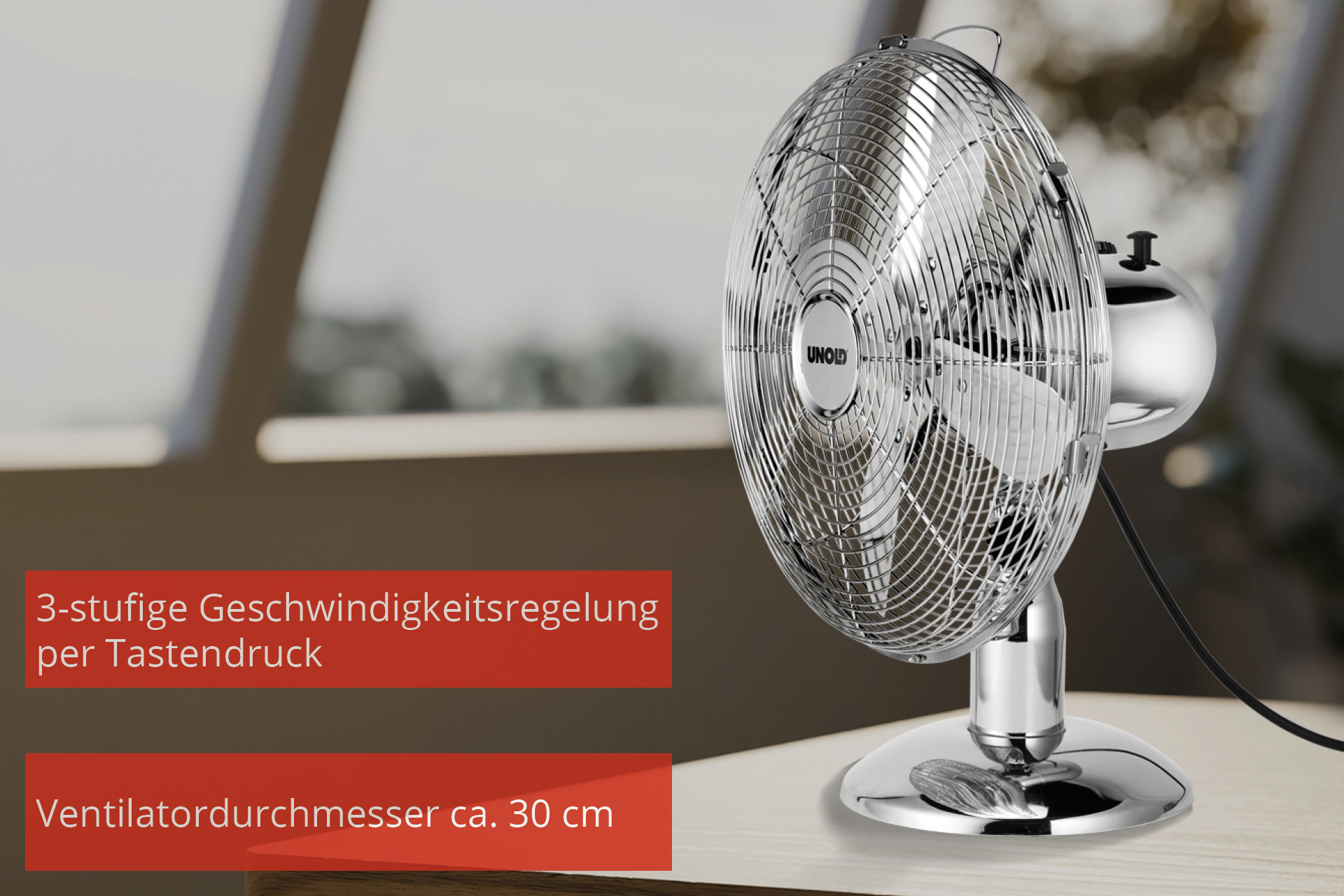 Ein glänzender Metallventilator mit drei Geschwindigkeitsstufen und 30 cm Durchmesser.