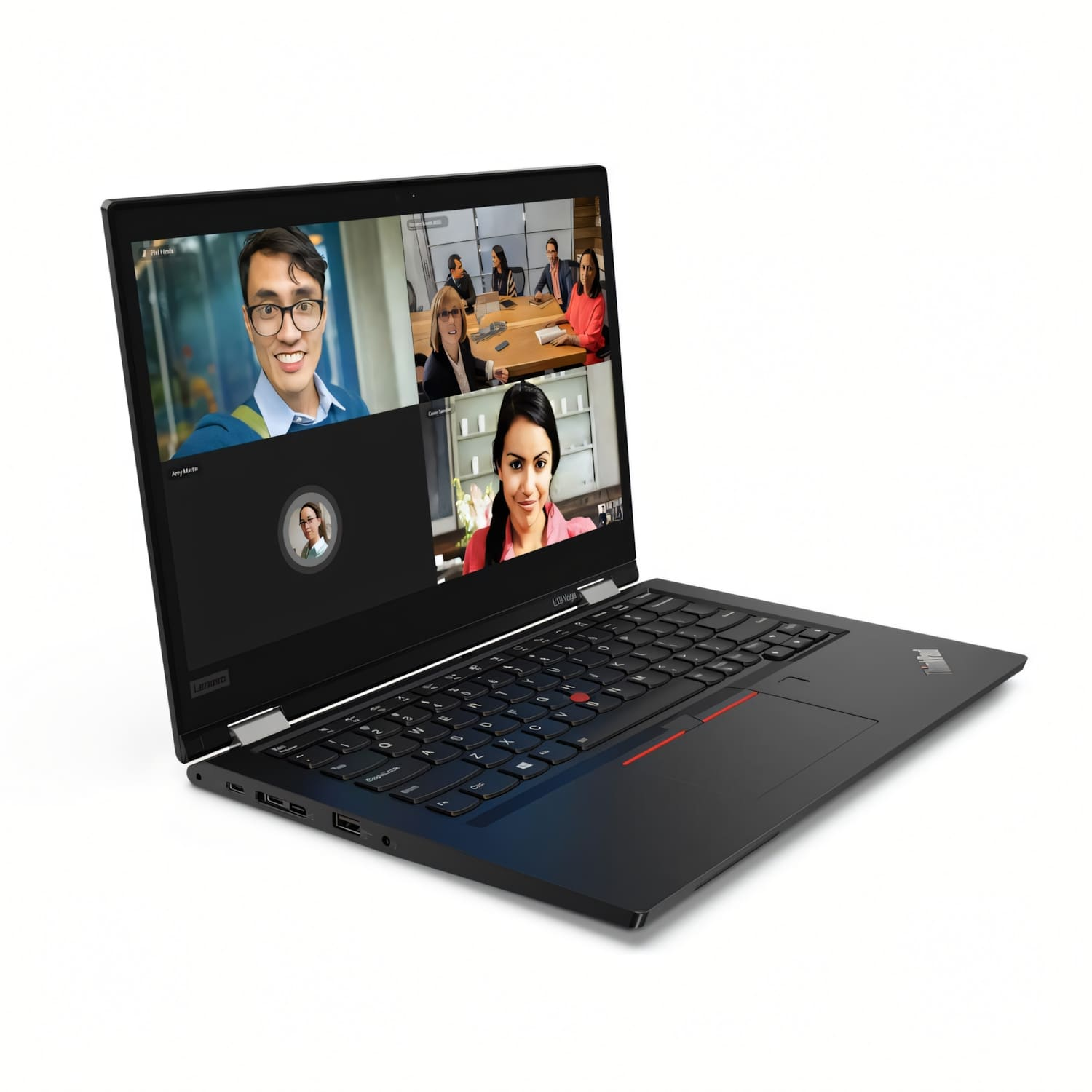 Un portátil abierto muestra una videollamada con cuatro personas en pantalla.