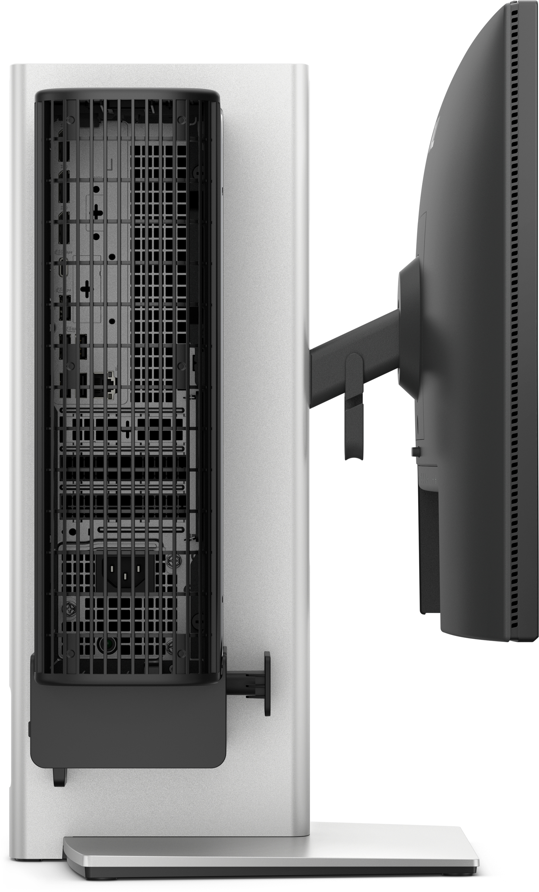 Een zilveren computertoren met open achterpaneel, naast een zwarte monitorarm.