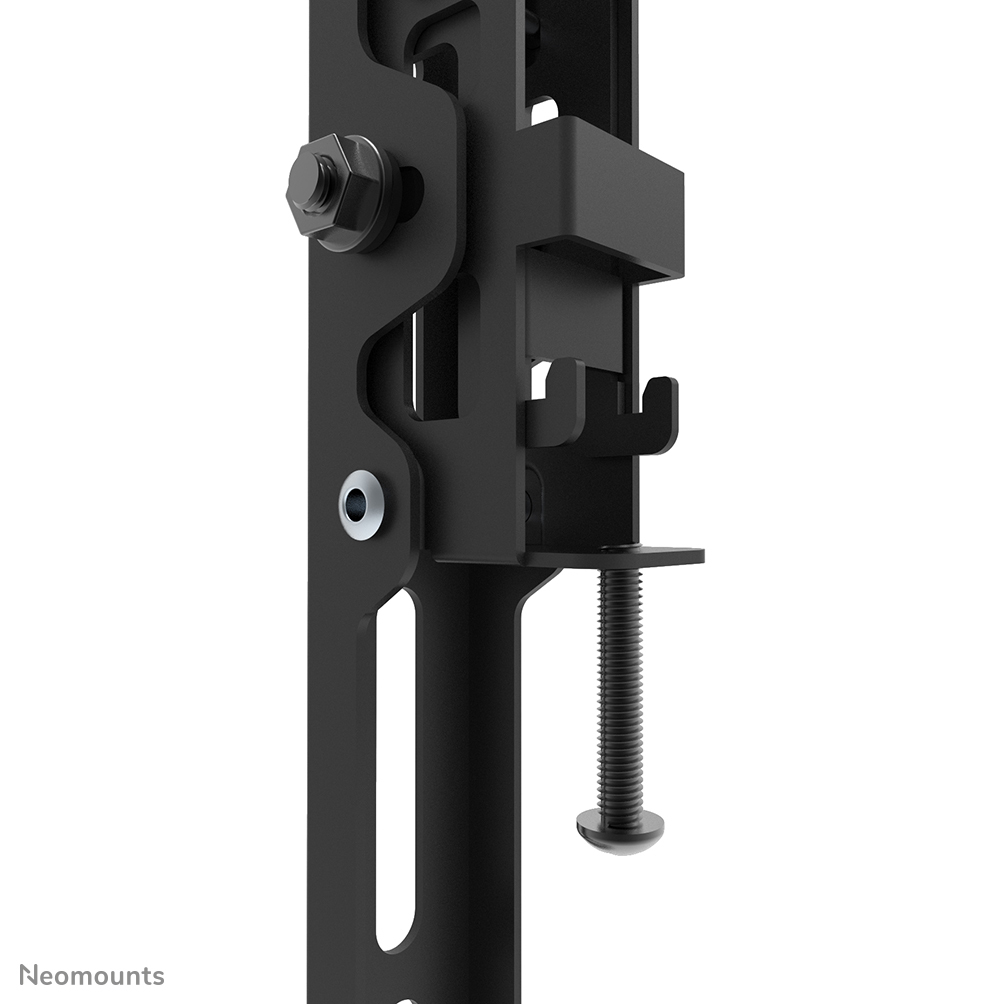 Close-up of a black metal mount with screws and bolts.