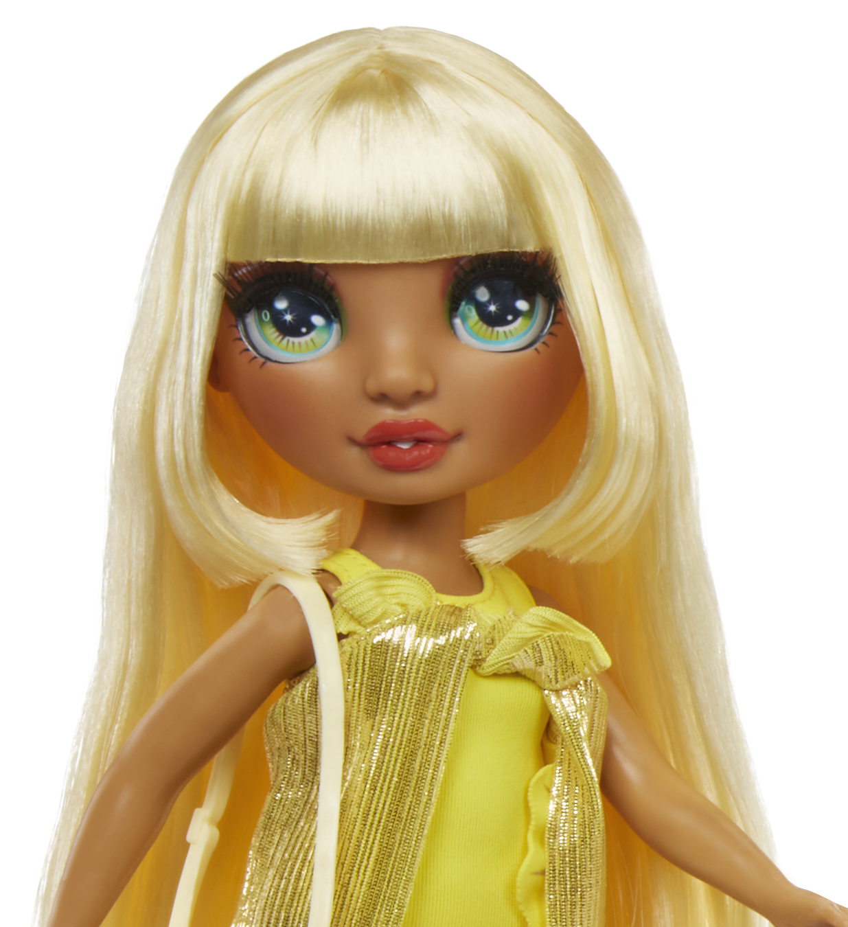 Eine Puppe mit langen blonden Haaren, großen Augen und gelber Kleidung.