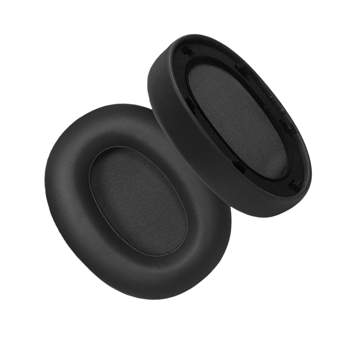 Dos almohadillas negras y ovaladas para auriculares, sobre fondo blanco.