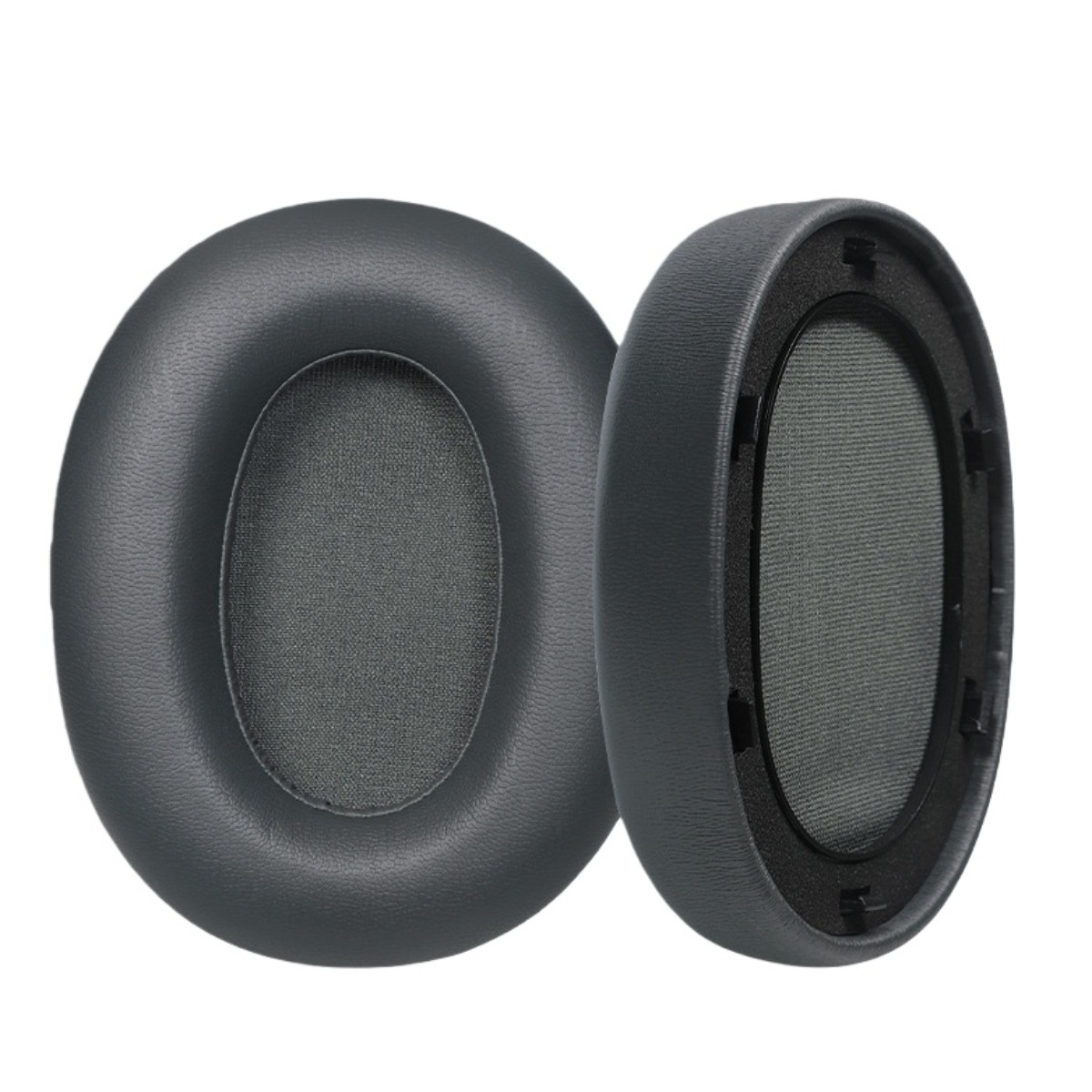 Dos almohadillas grises para auriculares, una de lado, una de frente.