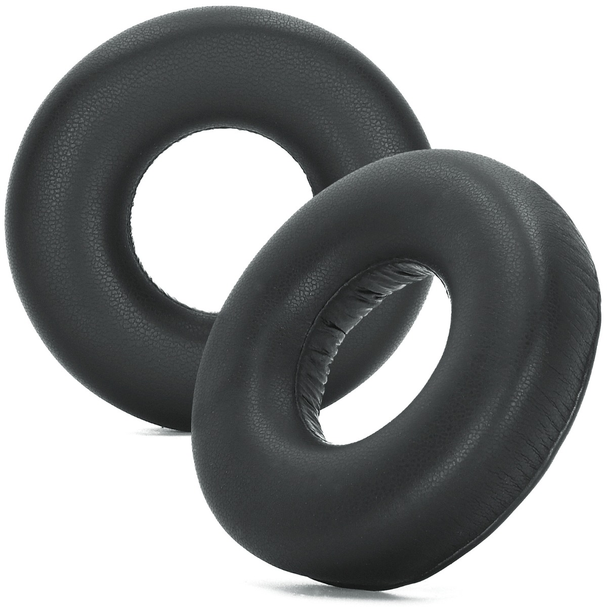 Dos almohadillas negras y redondas para auriculares sobre fondo blanco.