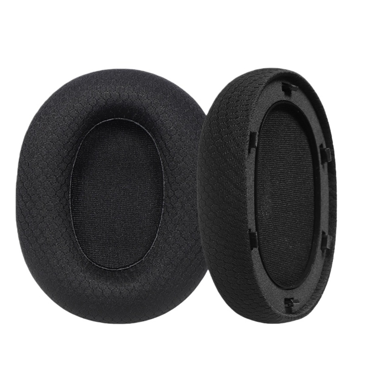 Dos almohadillas de auriculares negras sobre fondo blanco.