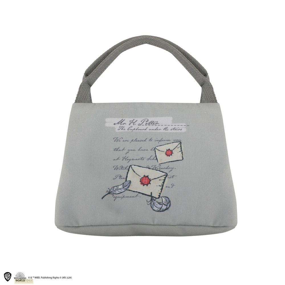 Graue Tasche mit Harry Potter Briefdesign und Henkeln.