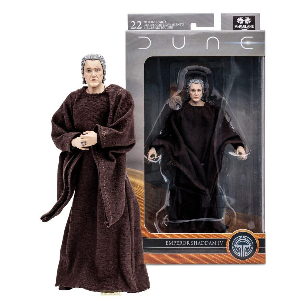 Eine Actionfigur von Emperor Shaddam IV in brauner Robe steht neben seiner Verpackung.