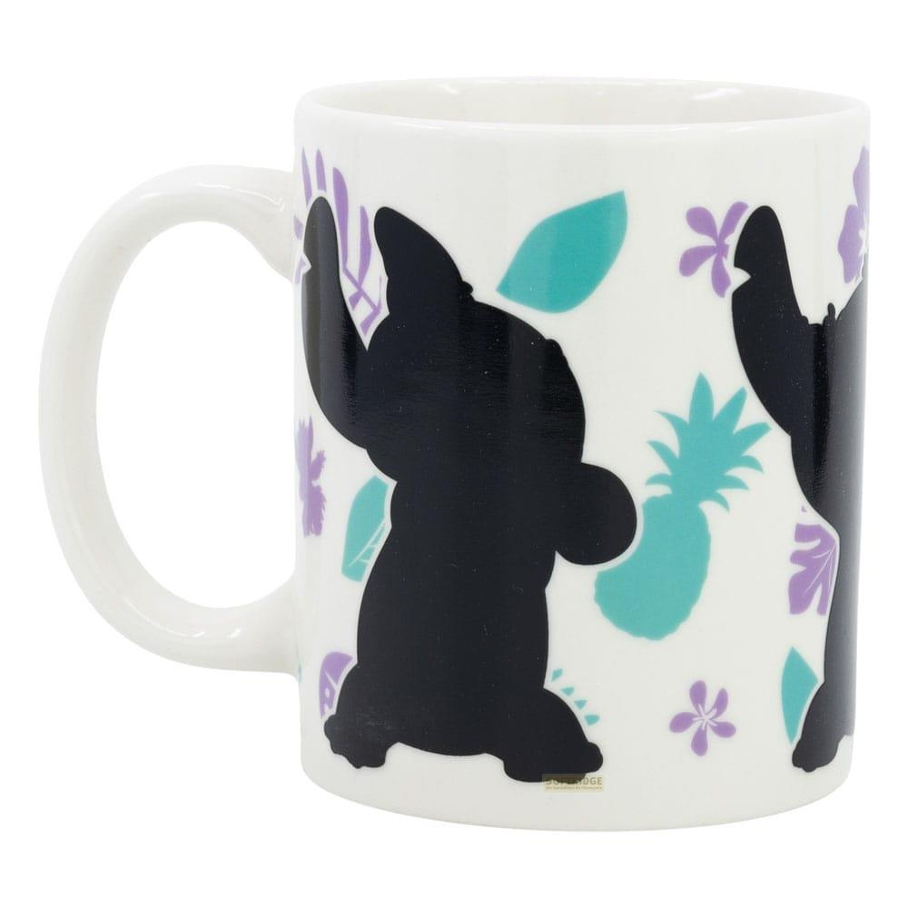 Weiße Tasse mit schwarzer Stitch-Silhouette, tropischen Blättern und Blumen.